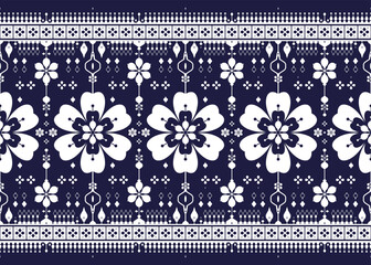 White symbol floral on dark blue background, ethnic fabric seamless pattern, design for cloth, carpet, batik, wallpaper, wrapping etc.