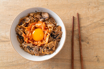 Wall Mural - pork bulgogi rice bowl with kimchi and Korean pickled egg