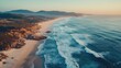 © P.G - Aerial shot of the wide sandy beaches and rocky promontories of Plettenberg Bay, with ocean waves lapping the shore