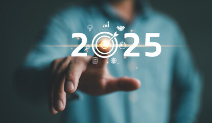 Poster - Positive indicators in 2025, Businessman touching target icon on virtual screen with 2025. Startup business 2025. Merry Christmas and happy new year concept. Idea and inspirations in new years 2025.