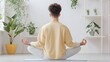 © ChubbySunday - Alone in a cozy room,practicing yoga or meditation for relaxation and mindfulness