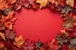 © MUdaylah - Autumn frame border of maple leaves on red background. Happy Thanksgiving Day, Halloween, Harvest concept with generative ai