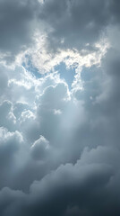 Poster - Light peeks through dark storm clouds.