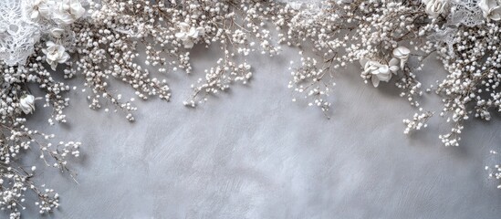 Fototapete - Silver lace adorned with clusters of small white flowers. with copy space image. Place for adding text or design