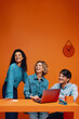 © Jacob Lund - Creative team in monochromatic orange set with colorblocking elements