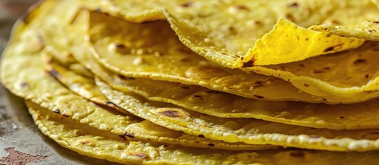 Poster - A pile of corn tortillas set against a white background. with copy space image. Place for adding text or design