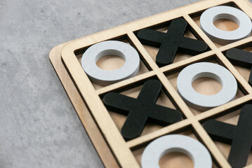 Wooden Tic Tac Toe Game on a Table: Classic Strategy and Fun for All Ages