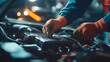 © Daniel - Technician Hands of car mechanic working repair in auto repair Service electric battery and Maintenance of car battery. Check the electrical system inside the car