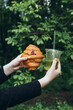 © ADDICTIVE STOCK - Teenager enjoying a croissant and matcha drink outdoors