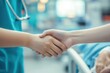 © Premium Photo - A healthcare worker in scrubs holding a patient’s hand in a hospital setting, showing compassion and empathy, representing patient care.