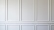 © Olly Photography - Clean, white paneled wall providing an elegant and minimalist backdrop suitable for various interior design and decor purposes.