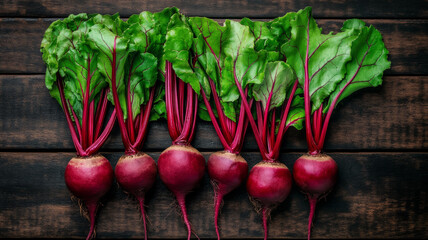 Canvas Print - Deep red beets with earthy roots against a wooden stall background market ambience natural lighting 