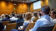© Media Srock - Audience Seated in Conference Room Listening to Presentation