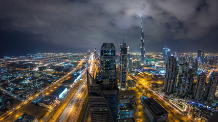 Wall Mural - Panoramic skyline of Dubai night timelapse, United Arab Emirates.