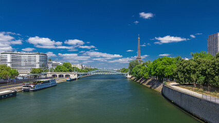 Wall Mural - Eiffel tower at the river Seine timelapse hyperlapse from bridge in Paris, France