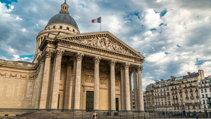 National pantheon building timelapse, front view with street and people. Paris, France