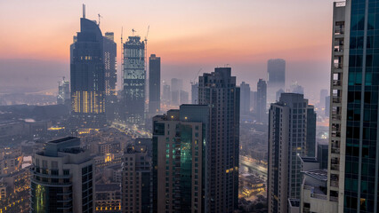 Foggy morning in downtown of Dubai night to day timelapse.