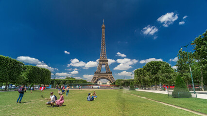 Wall Mural - Eiffel Tower on Champs de Mars in Paris timelapse hyperlapse, France