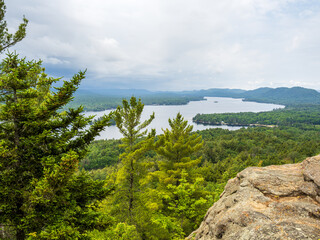 Fourth Lake disappearing in the distant wilderness seen from the summit on the Rocky Mountain hiking trail in Adirondacks, New York.