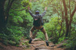 © Rattanapon - Happy backpacker man jumping on the top of the mountain, successful fun happy man.