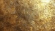 © chanidapa - Gold foil texture with a distressed, crinkled surface, offering a rustic yet elegant background