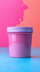 Wall Mural - A jar of pink paint sits on a table