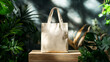 © Anthichada - A beige canvas tote bag mockup on wooden product display podium with nature leaves background, Eco friendly totebag mock up made of natural cotton. Reusable shopper ecobag canvas for design