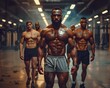 © Bussakon - Muscular Bodybuilders Encouraging Each Other in High Energy Gym Workout Session