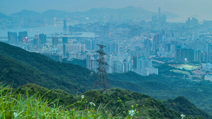 Wall Mural - Day to night timelapse from Fei ngo shan Kowloon Peak night Hong Kong cityscape skyline.