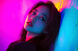 © Hunman - Fashion portrait of young Asian woman in colorful lighting.