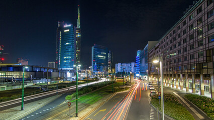 Milan skyline with modern skyscrapers in Porta Nuova business district night timelapse hyperlapse in Milan, Italy