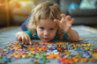 © Stas - Little girl playing with jigsaw puzzles at home. Adorable happy little child playing with puzzle. Children development.