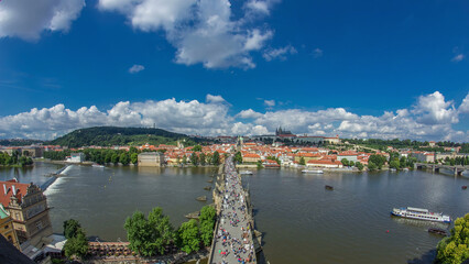 Wall Mural - Charles Bridge and Prague Castle timelapse, view from the Bridge tower, Czech Republic