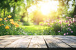 © agnes - A wooden table in a sunny garden surrounded by flowers and greenery creating a bright and peaceful outdoor setting