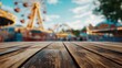 © Supriyanto - Wooden Tabletop with Blurred Amusement Park Background