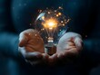 © panu101 - Businessman Holding a Lit Light Bulb - Symbolizing Futuristic Technology,Creativity,and Business Success