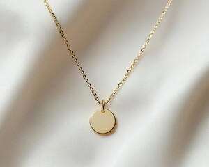 Minimalist gold necklace with a small circle charm, top view, soft shadows, neutral background