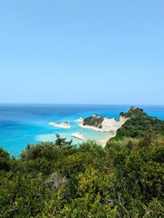 Beautiful view over Cape Drastis on the island of Corfu in Greece on a sunny summer's day with turquoise blue water