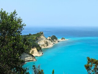 Beautiful view over Cape Drastis on the island of Corfu in Greece on a sunny summer's day with turquoise blue water