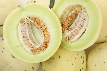 Fresh ripe honeydew melons as background, top view