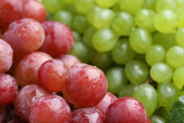 Delicious fresh ripe grapes as background, closeup