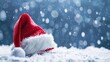 © CreativeSeven  - Festive Santa Hat in Snow with Falling Snowflakes and Bokeh Lights Creating a Magical Winter Holiday Scene