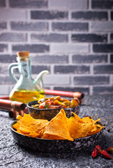 Wall Mural - Nachos with guacamole and vegetables.