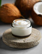 © hardvicore - Jar of coconut body butter on round stone podium. Organic beauty product. Natural cosmetics.