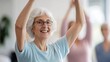 © Anny - Senior woman being assisted with her daily exercises, encouraging and supportive care, bright setting
