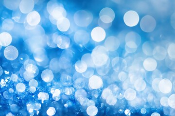 Canvas Print - Soft blue bokeh effect created by light reflecting on water droplets during a bright sunny day