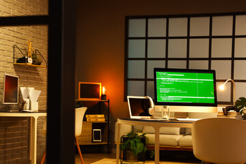 Wall Mural - Interior of dark office with programmer's workplaces