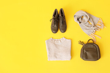 Poster - Composition with stylish female clothes, shoes and accessories on yellow background