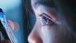 © @_ greta - Close-up of a girl's eye looking at a phone screen