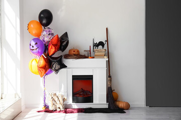 Poster - Interior of living room with fireplace, Halloween decor and balloons